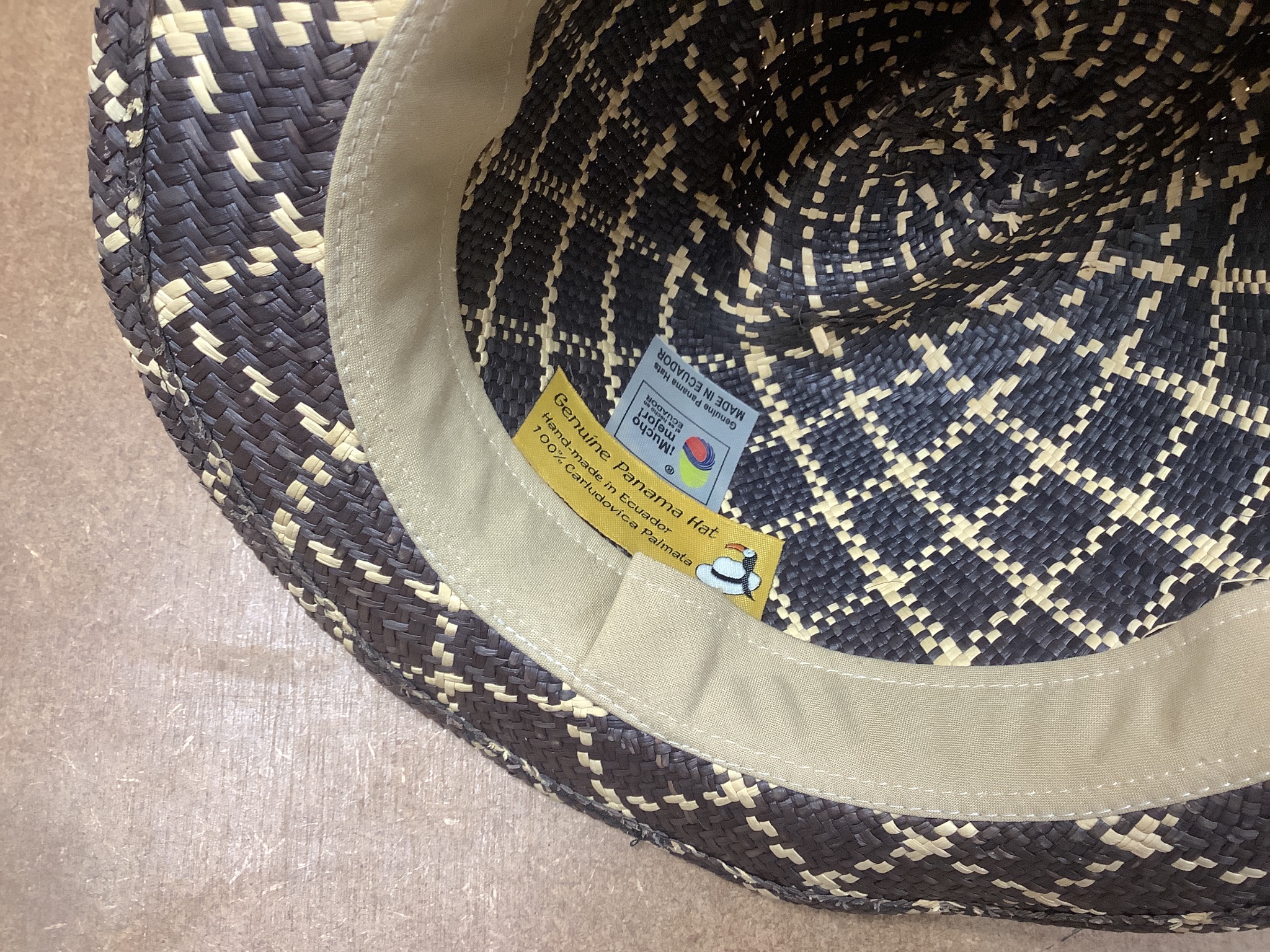 A Moroccan Fez and a Panama hat in a Dunn & Co hat box together with a hat stand